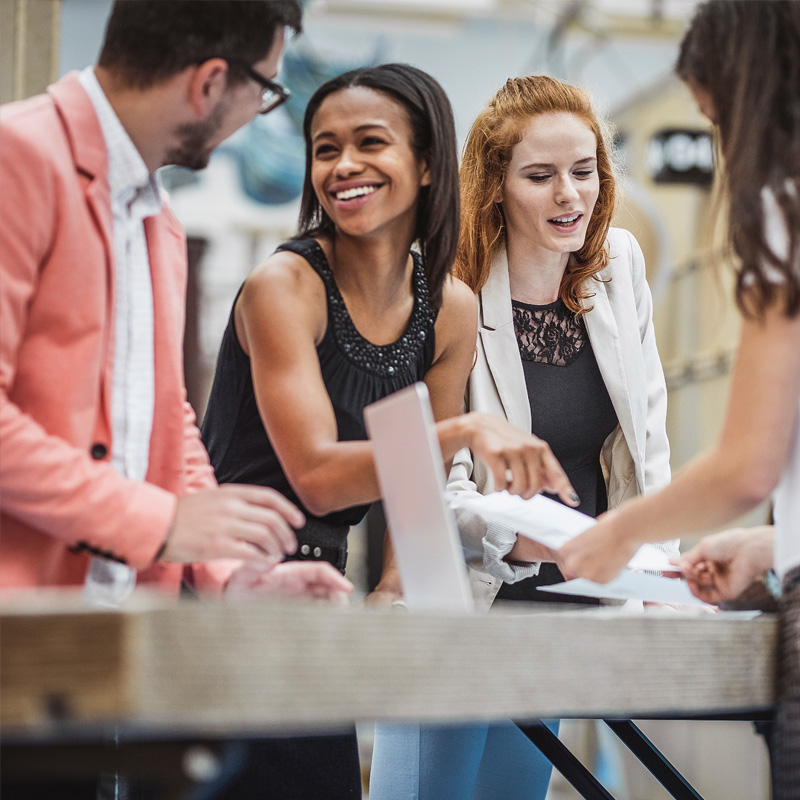 Professionals networking at an event